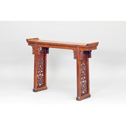 A Huanghuali Wood Altar Table with Flanges